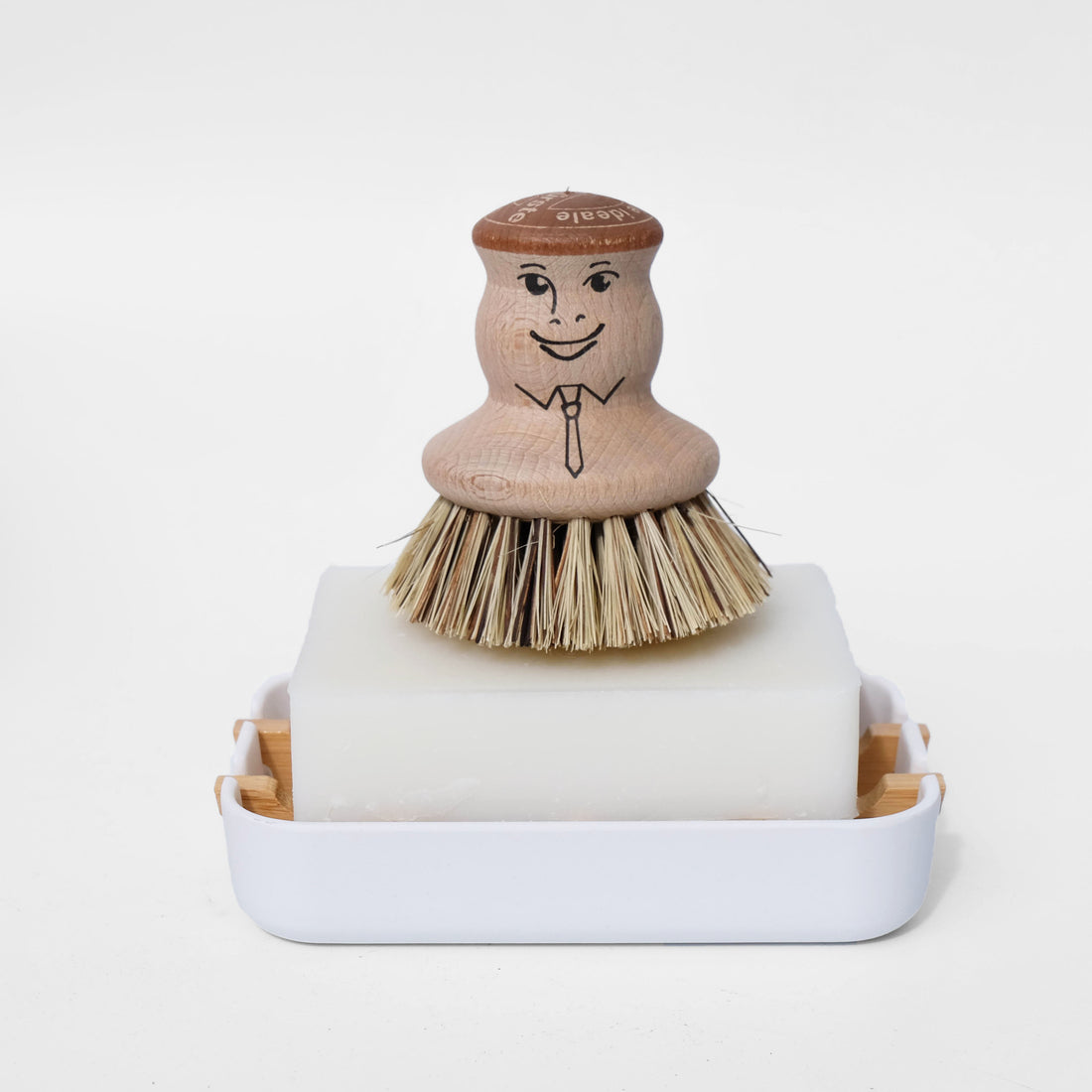 wood pot brush with smiling face