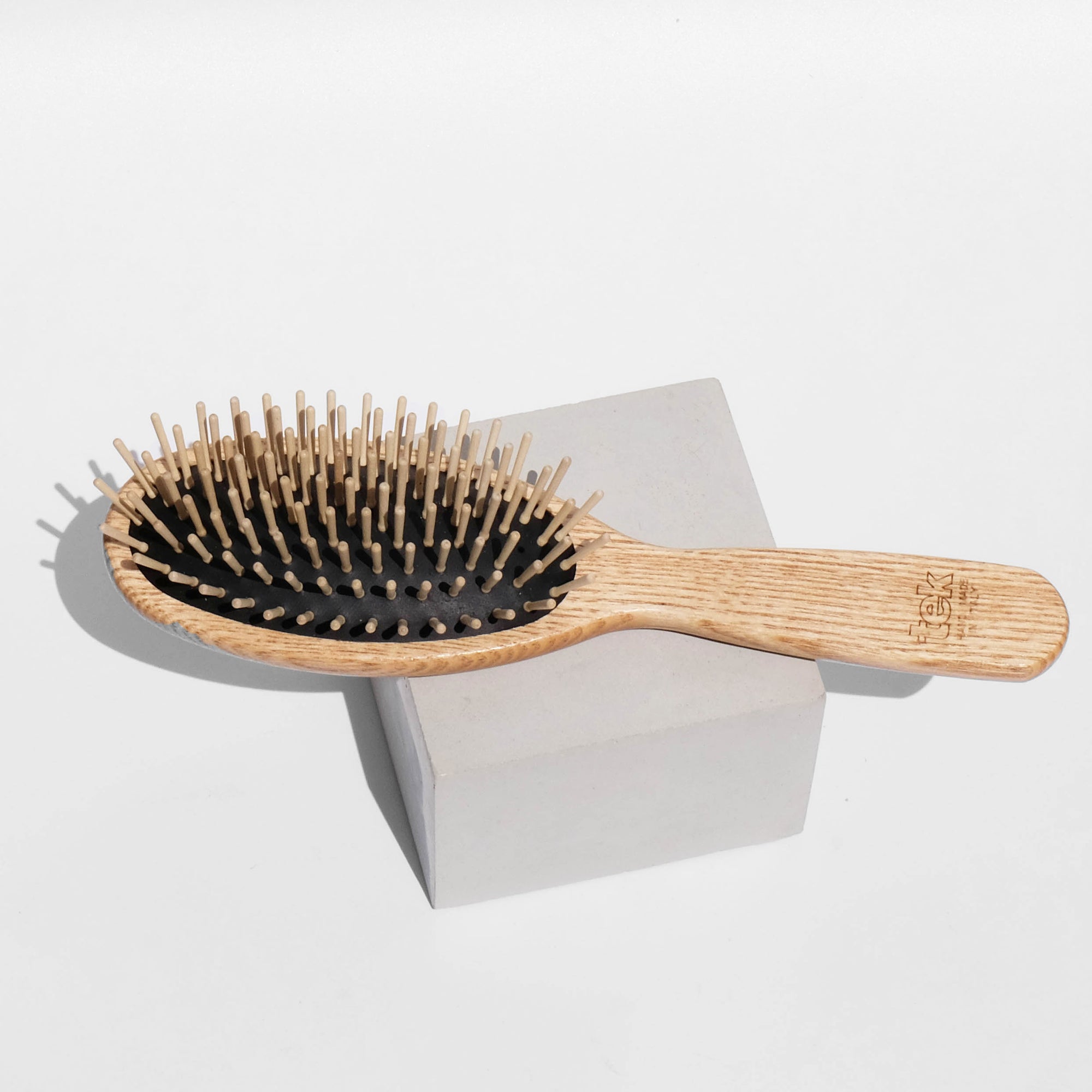 wooden hairbrush with pins