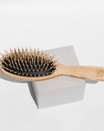 wooden hairbrush with pins