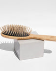 wooden hairbrush with pins