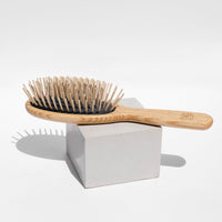 wooden hairbrush with pins