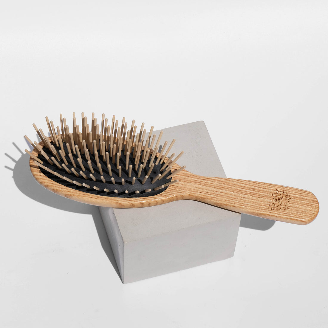 wooden hairbrush with pins