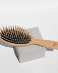 wooden hairbrush with pins