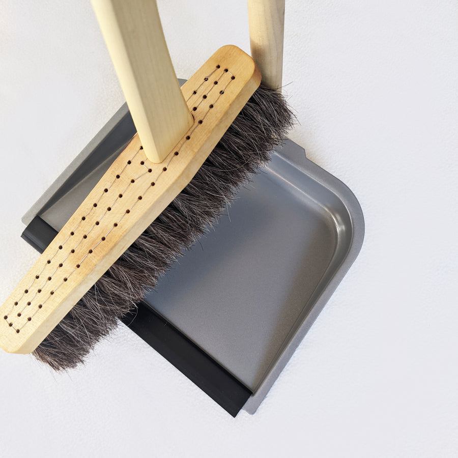 wooden broom and dustpan
