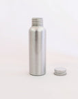 3 oz. aluminum bottle with lid removed