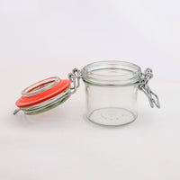 glass jar with hinged lid open