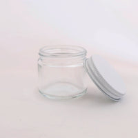2 oz. glass jar with lid removed
