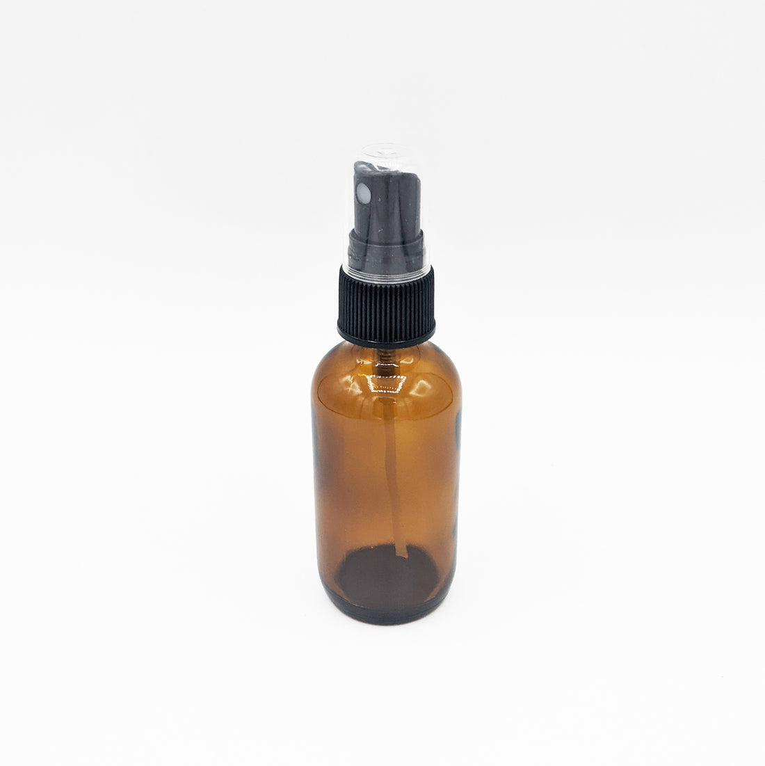 Amber glass bottle with spray nozzle